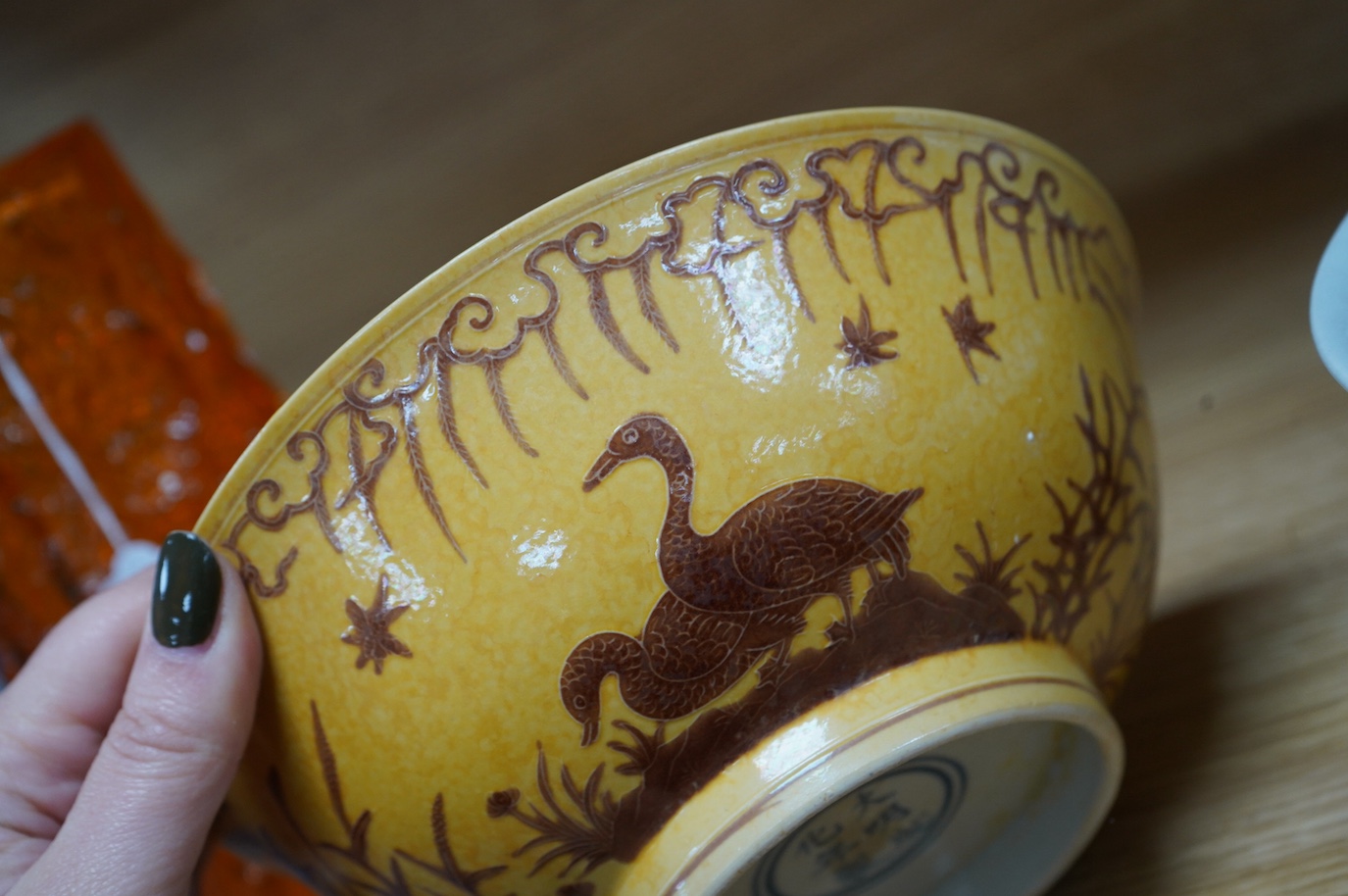 A Chinese celadon bowl and a fine yellow and brown decorated bowl, yellow bowl 9cm diameter. Condition - good